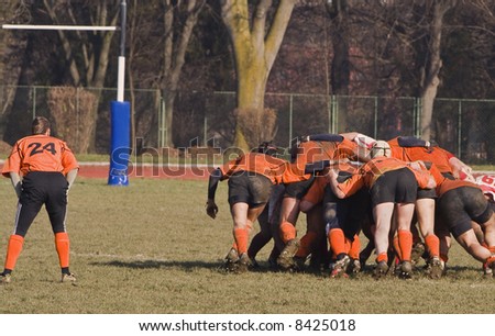 Image of a scrum during a rugby match.