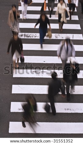 Group of people crossing the street-upper view