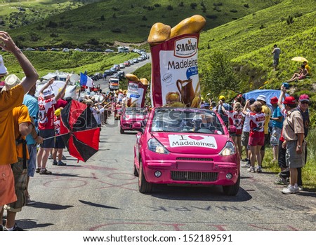 VAL LOURON, FRANCE - JUL 7:Vehicles advertising St. Michel Madeleines on the road to Col de Val Louron Azet during the stage 9 of  Le Tour de France on July 7 2013