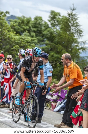 ALPE D\'HUEZ, FRANCE, JUL 18:The Belarusian cyclist Kanstantsin Siutsou from Team Sky climbing the difficult road to Alpe-D\'Huez, during the stage 18 of of Le Tour de France on July 18 2013