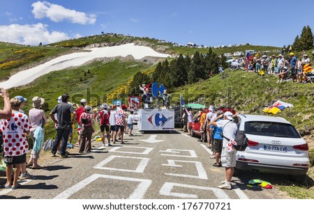 PORT DE PAILHERES,FRANCE- JUL 6:Carrefour truck at the mountain pass Pailhere in Pyrenees Mountains during the passing of the publicity caravan in stage 8 of Le Tour de France on July 6 2013