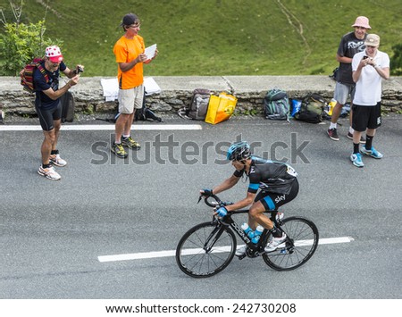 COL DE PEYRESOURDE,FRANCE- JUL 23:The cyclist Vasili Kiryienka (Sky) climbing as a leader the road to Col de Peyresourde in Pyrenees Mountains in the stage 17 of Le Tour de France on 23 July 2014.