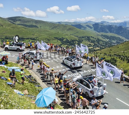 COL DE PEYRESOURDE,FRANCE- JUL 23:Skoda caravan on the road to Col de Peyresourde in Pyrenees Mountains during the passing of the Publicity Caravan  - stage 17 of Le Tour de France on 23 July 2014.