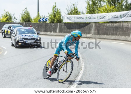 COURSAC,FRANCE-JUL 26:The Italian cyclist Michele Scarponi (AstanaTeam) pedaling during the stage 20 ( time trial Bergerac - Perigueux) of Le Tour de France 2014.