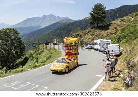 COL D\'ASPIN,FRANCE - JUL 15: Mc Cain Caravan during the passing of the Publicity Caravan on the Col d\'Aspin in Pyerenees Mountains during the stage 11 of Le Tour de France on Juy 15, 2015.