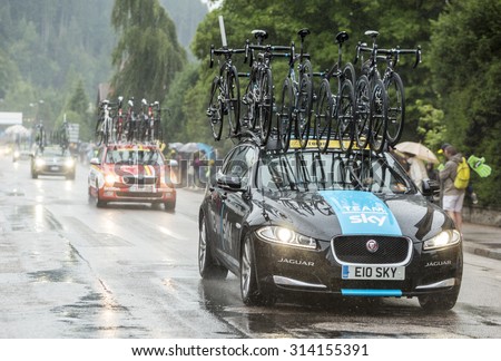 GERARDMER,FRANCE - JUL 12:Technical car of the Team Sky driving in the rain during the stage 8 of Le Tour de France on July 12, 2014 in Gerardmer