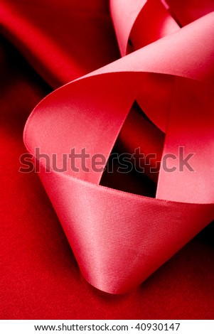 Abstract holiday background with pink ribbon