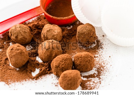 Chocolate truffles. Handmade chocolate truffle candies with cocoa powder