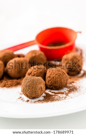 Chocolate truffles. Handmade chocolate truffle candies with cocoa powder