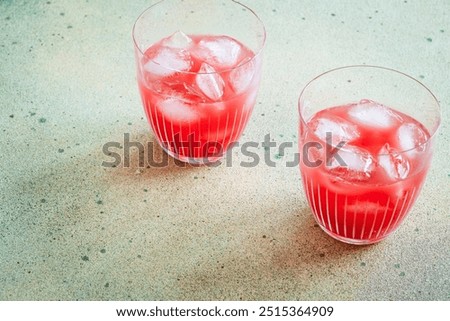 Similar – Image, Stock Photo Homemade refreshing mocktail with soda and orange juice