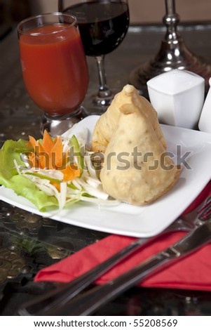 samosa and red juice. indian food