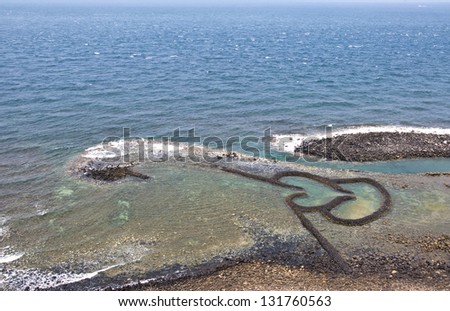 Taiwan Landmark Twin Hearts Stone Tidal Weir in Chimei Taiwan scenery