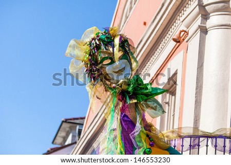 A resident of the French Quarter in New Orleans decorates their home with Mardi Grad colors
