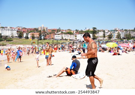 NEW SOUTH WALES, AUSTRALIA - JANUARY 24 : Traveler and Australian people come to Bondi Beach for relax and swimming or surfing at Sydney on January 24, 2015 in New South Wales, Australia.