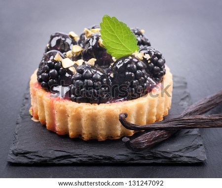 Fresh cakes with blackberries