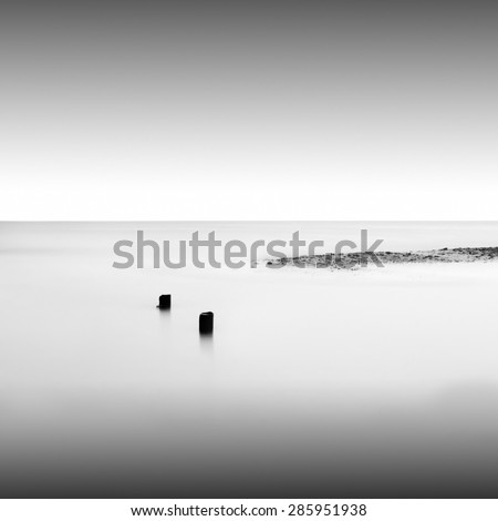 black and white minimalistic seascape, daytime long exposure.  black sea, odessa, ukraine