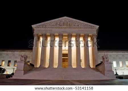 The US Supreme Court building at night in horizontal