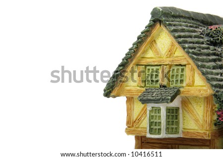 Part of ceramic house isolated over white background