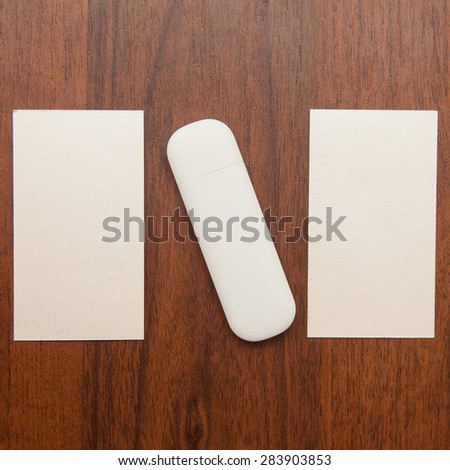 business cards and flash card on a wooden background