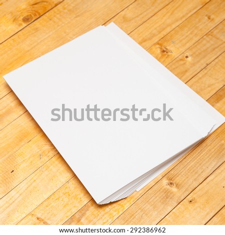 blank forms on a wooden background.