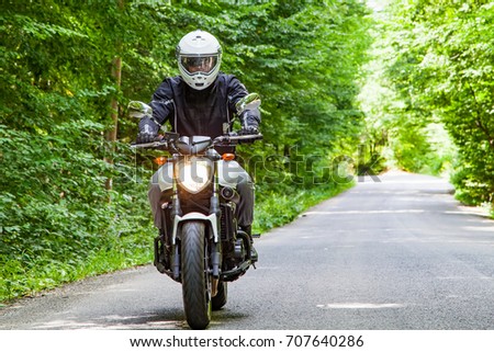 Similar – Foto Bild fahrt auf dem motorrad quer durch den norden griechenlands | roadmovie