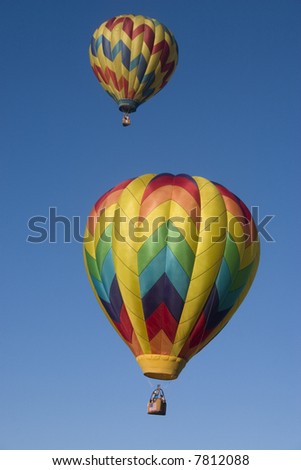 Hot air balloons in flight on a summer evening
