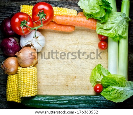 Vegetables vintage border and empty cutting board