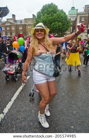 LONDON - JUNE 28: People take part in London's Gay Pride, 2014 Worldpride on June 28, 2014 in London, UK, estimated 25,000 people took part in the march, Parade to support gay rights.