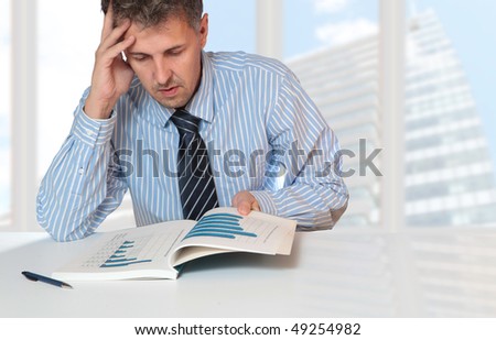 businessman working analyzing a annual report