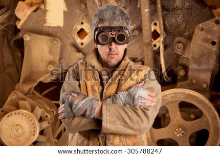 Steampunk man wearing glasses. Post-apocalypse fantasy