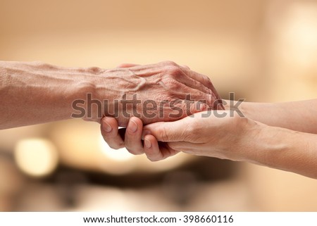 Similar – Image, Stock Photo Closeup of female hands pouring hot tea into enamel cup outdoors