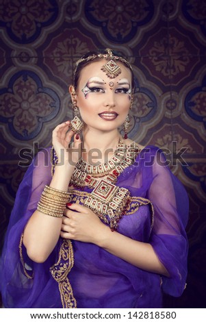 Shot of an oriental woman in a traditional costume.