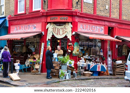 London, England-May 28,Merchant in front of his antiquarian on May 28, 2014 in Notting Hill, London