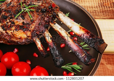 grilled meat ribs ready to eat with vegetables