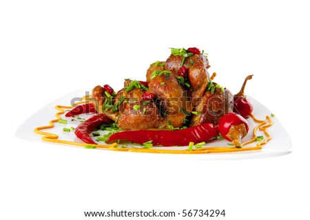 meat and hot peppers on white plate