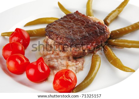 roast beef steak in melted yellow cheese on white