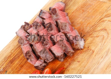 holiday evening dinner american meat : big rare roast steak on wood isolate on white background