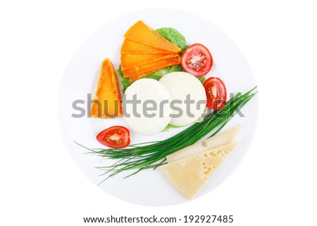 fresh aged cheese : parmesan roquefort and gruyere with soft feta on plate with isolated over white background