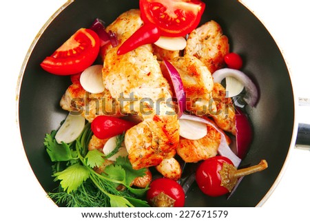 chicken with tomatoes and hot peppers on pan