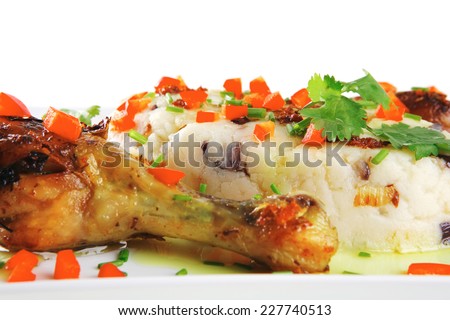 chicken legs served with vegetables on porcelain plate