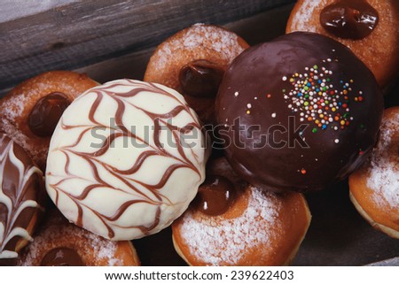 traditional jewish holiday chanuka donuts in retro vintage tray isolated on white background