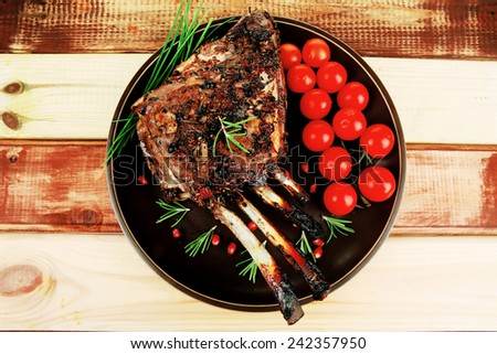 grilled meat ribs ready to eat with vegetables