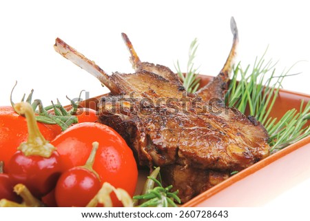 served main course: boned roasted ribs served with raw cherry tomatoes and fresh vegetables