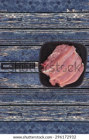 fresh raw turkey meat steak fillet over blue wooden table ready to cooking