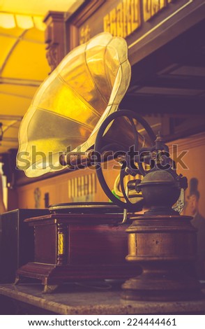 Ancient things. Old Gramophone, Coffee Grinders and Other Early Twenty Century Stuff.  Filtered image:cross processed vintage effect.