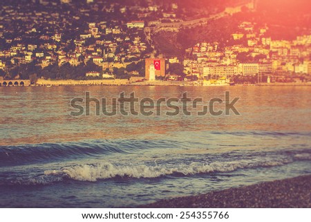 Sea beach in Alanya the morning at sunrise.Turkey, Mediterranean sea.Vintage style filter.Instagram toning effect.