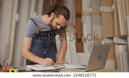 Similar – Image, Stock Photo Male carpenter working with wood in garage