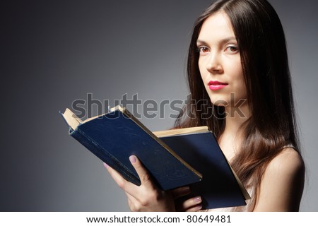 Young woman with two books