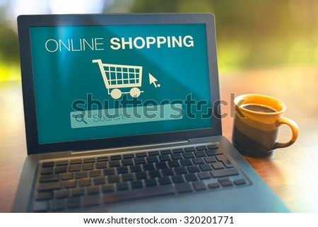Online shopping searching products from internet with laptop on table