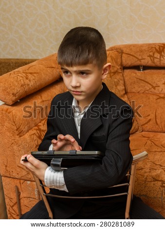 Boy at home with pc
